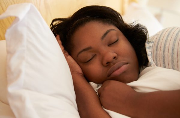 Overweight Woman Asleep In Bed